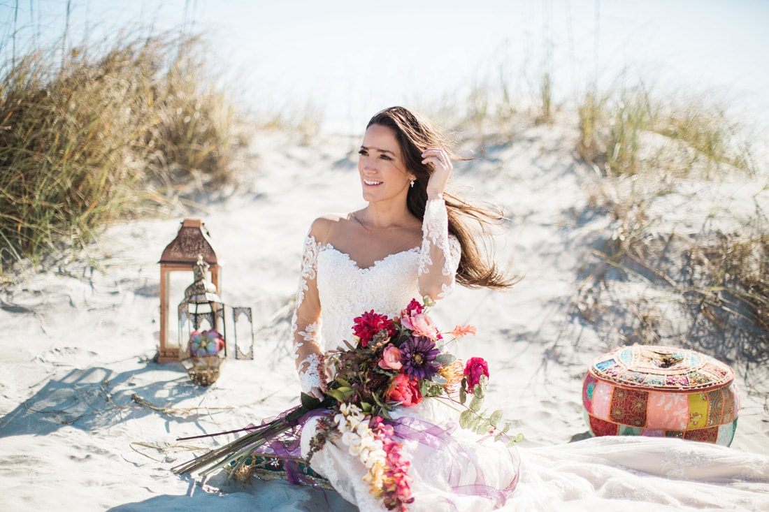 Olivia smiles softly for a romantic bridal portrait in Charleston, SC.