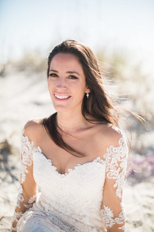 Candid bridal portrait of Olivia laughing during her Charleston session.