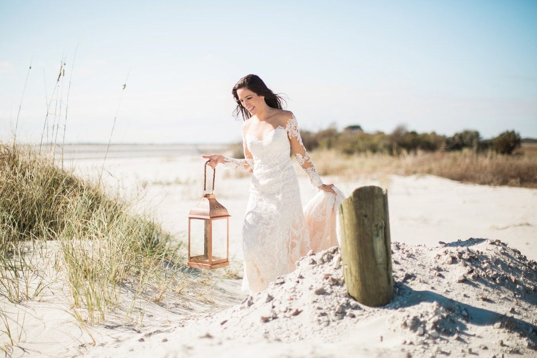 Olivia poses in her wedding gown for bridal portraits in Charleston, SC.