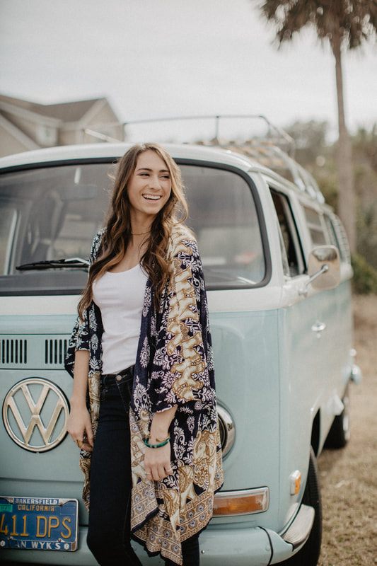Model wearing The Elephant Pants signature print in an outdoor campaign shoot.
