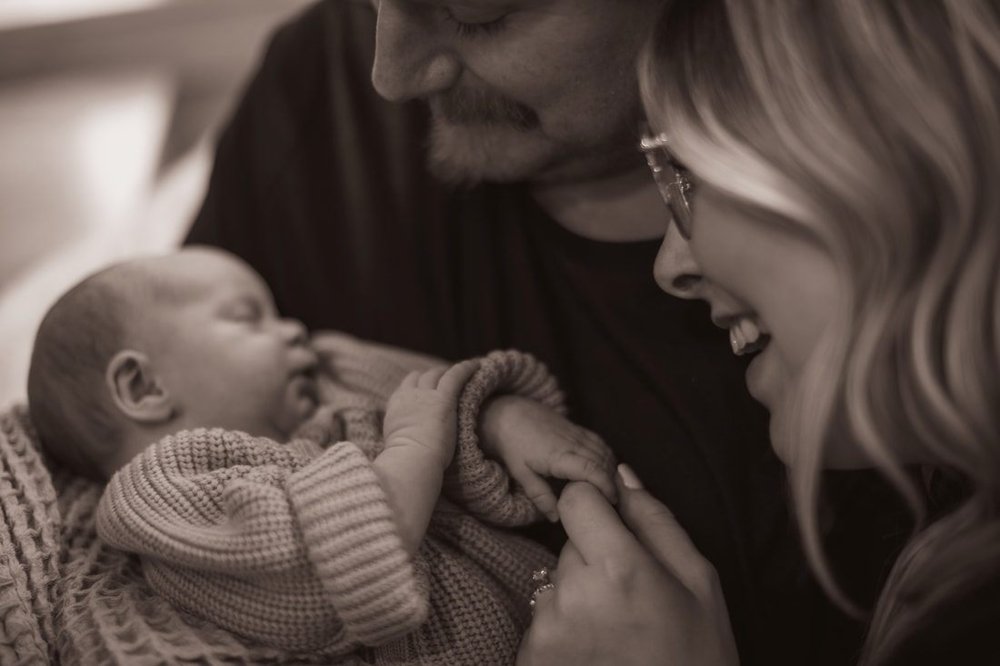 Candid portrait of the Pittis family in their Seattle home
