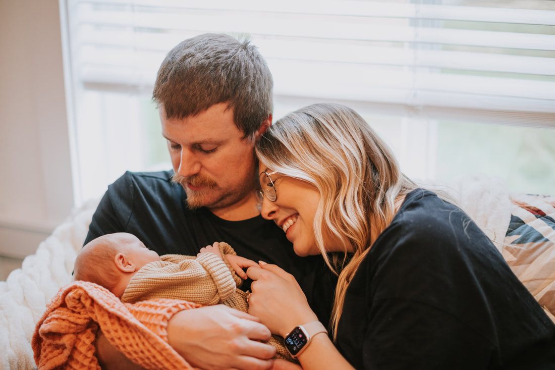 Newborn baby sleeping peacefully during an in-home session in Seattle