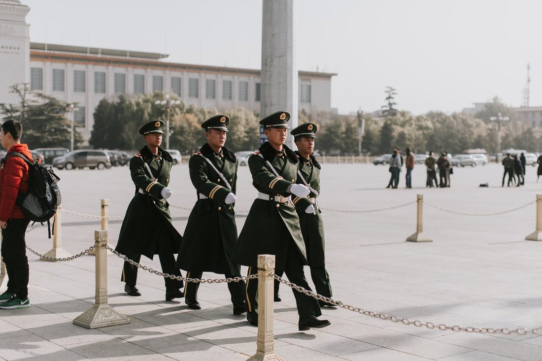 Elderly locals gathered in a park near the Temple of Heaven, Beijing