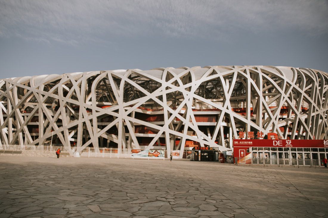 Beijing Olympic Center buildings lit up at night