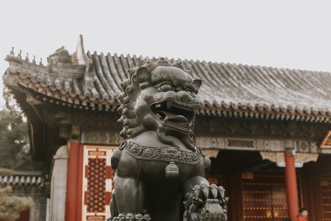 Elderly locals gathered in a park near the Temple of Heaven, Beijing