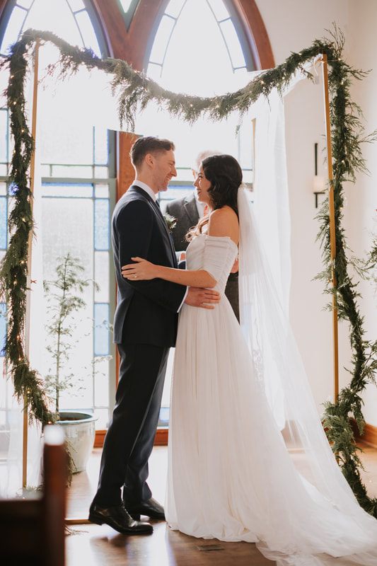 Bride and groom planting a tree to honor their wedding day