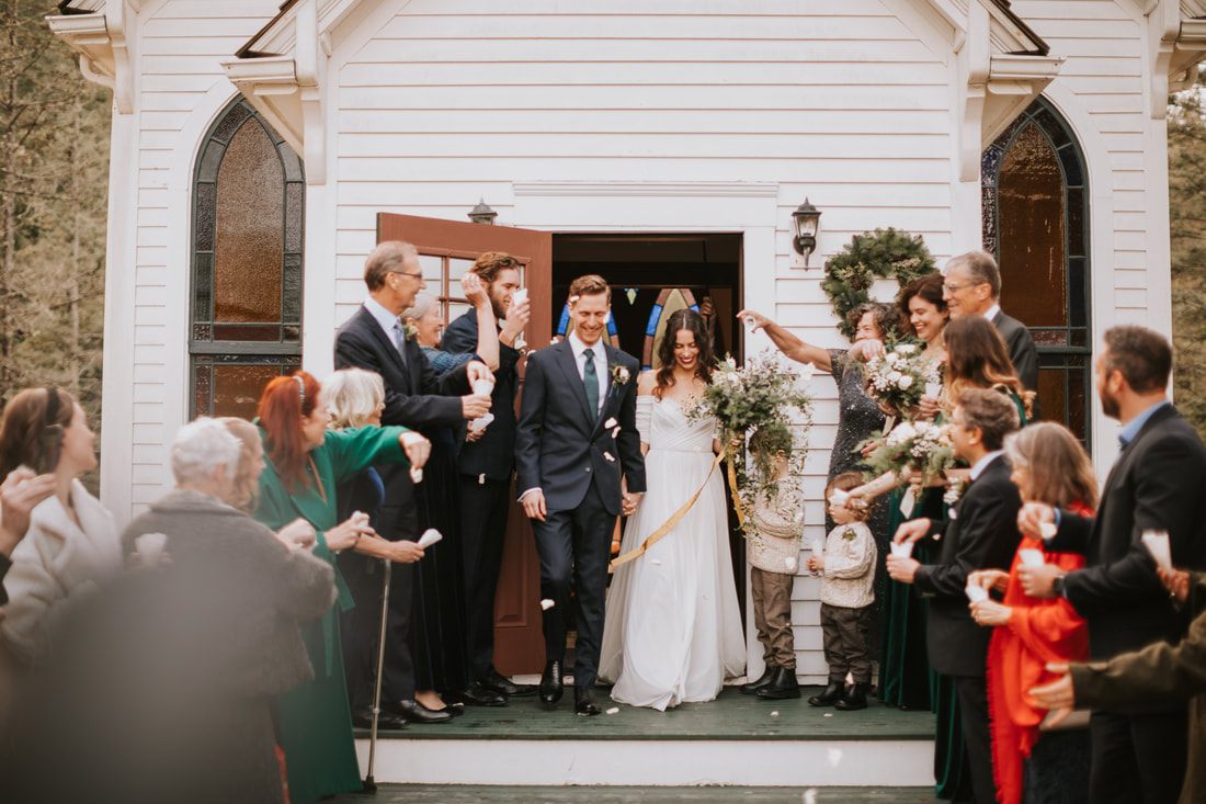 Bride walking down the aisle at Victorian Valley Chapel on Orcas Island