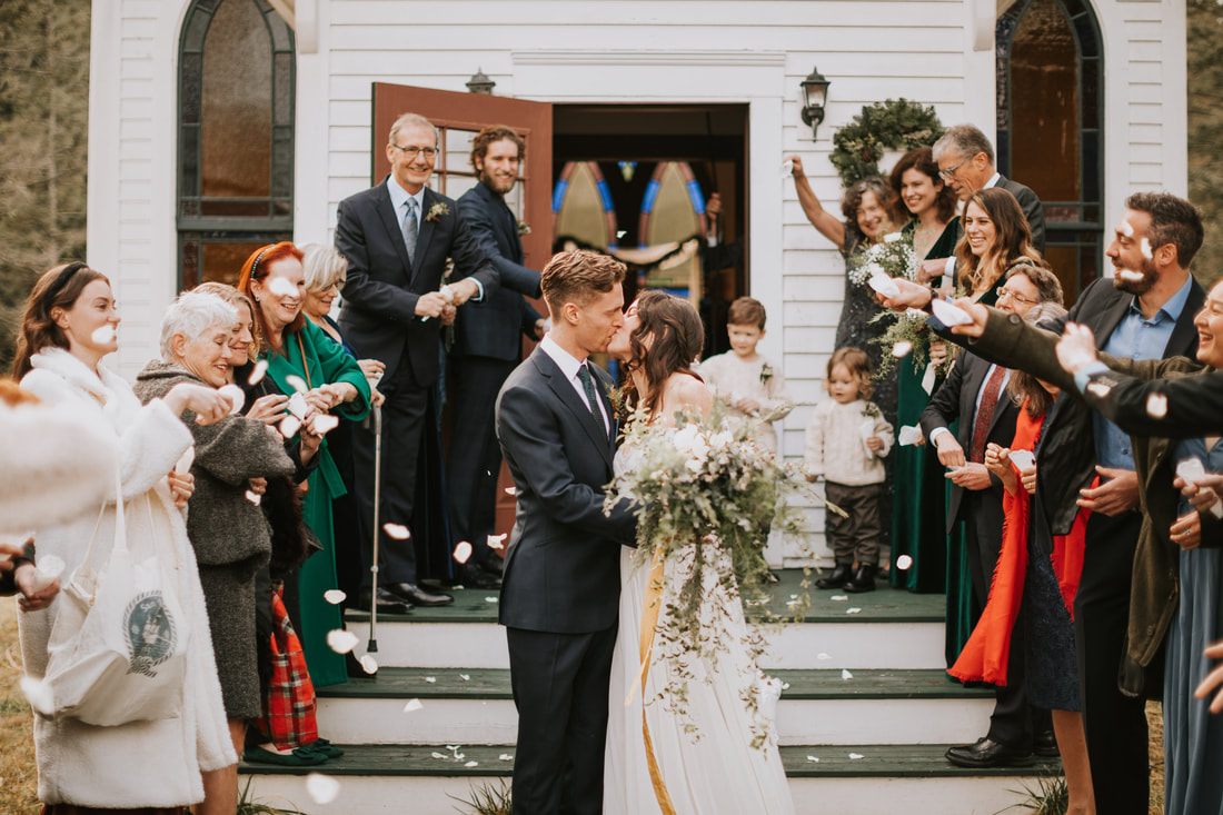 Bride and groom exchanging vows inside the Victorian Valley Chapel