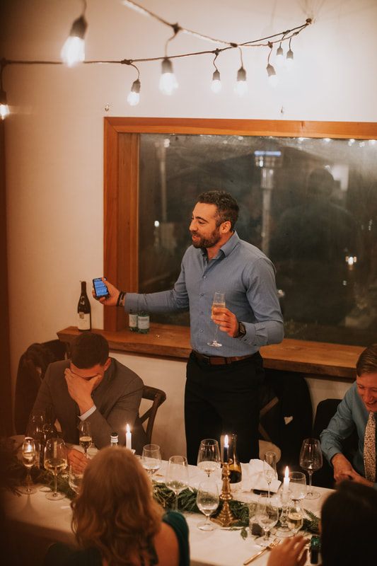 Best man giving a heartfelt speech during the reception