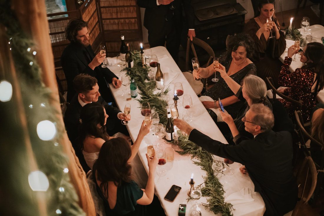 Guests enjoying hot apple cider and shortbread before the reception