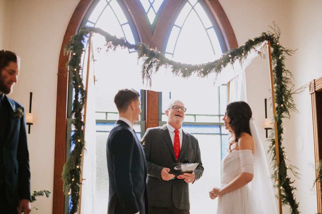Bride walking down the aisle at Victorian Valley Chapel on Orcas Island