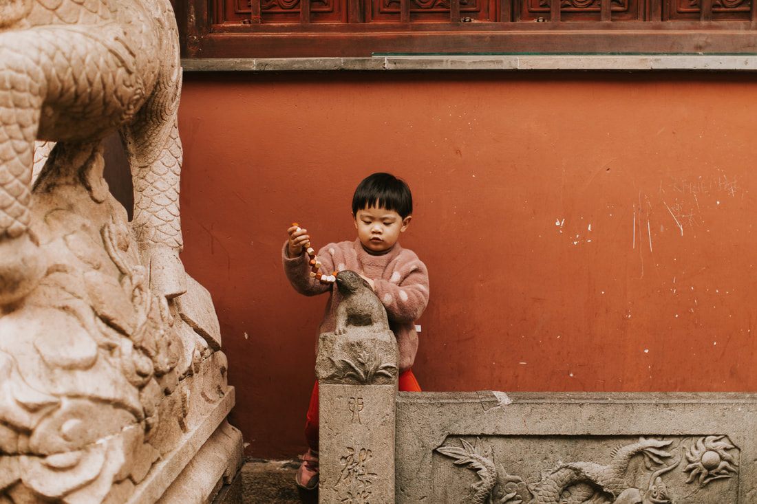Intricately detailed temple architecture in Shanghai, China.