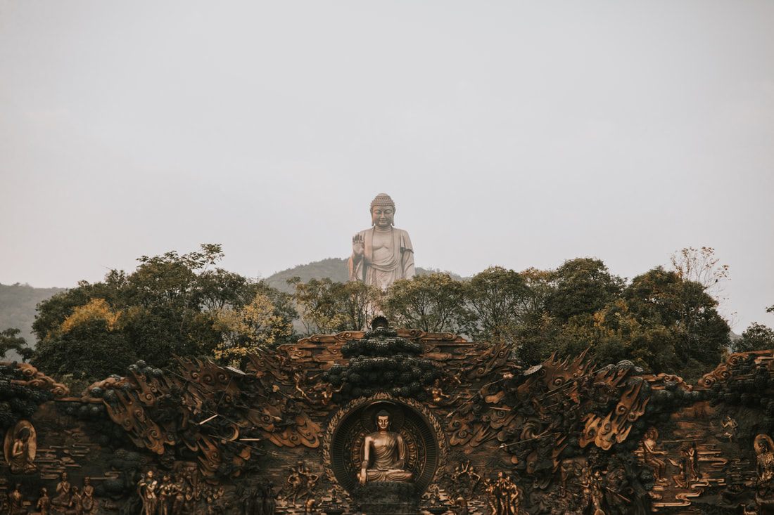 Ornate architecture and gardens at the Lingshan Buddhist complex