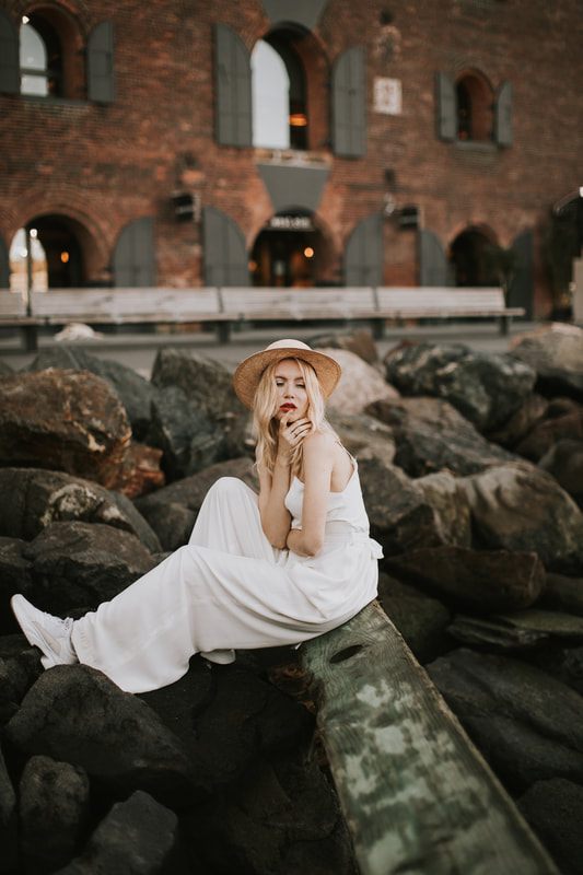 Valentina walking through Brooklyn in a non-traditional bridal look