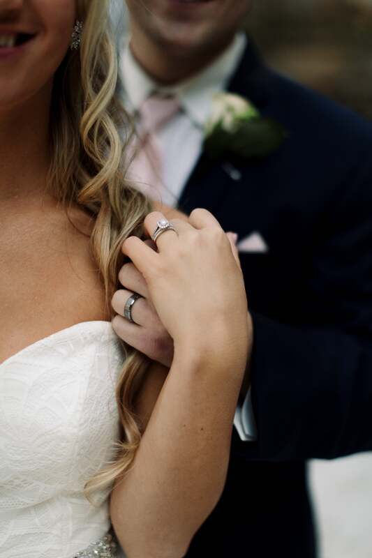 Bride laughing candidly during her Charlotte, NC wedding day