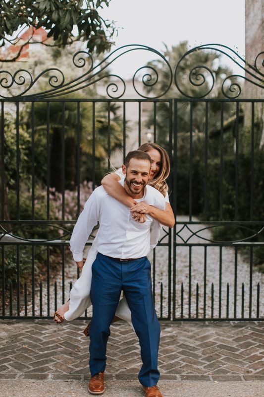 Final engagement portrait of Brandon and Kathleen in downtown Charleston