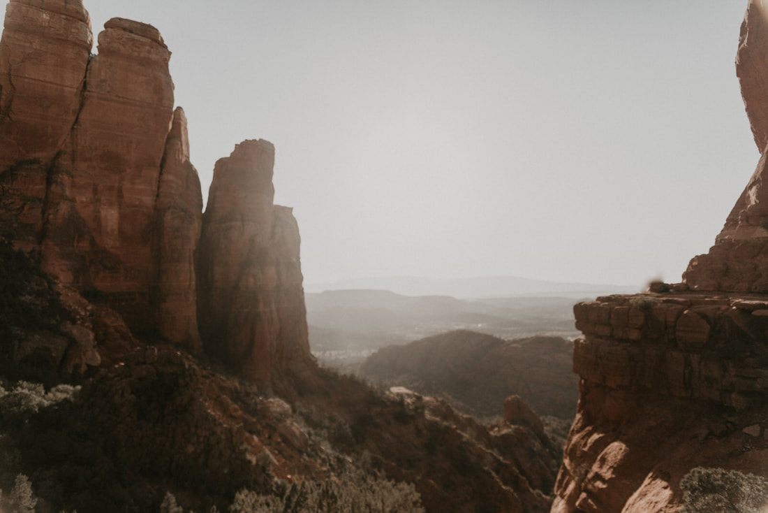 Sedona sunset casting warm light across the desert landscape.