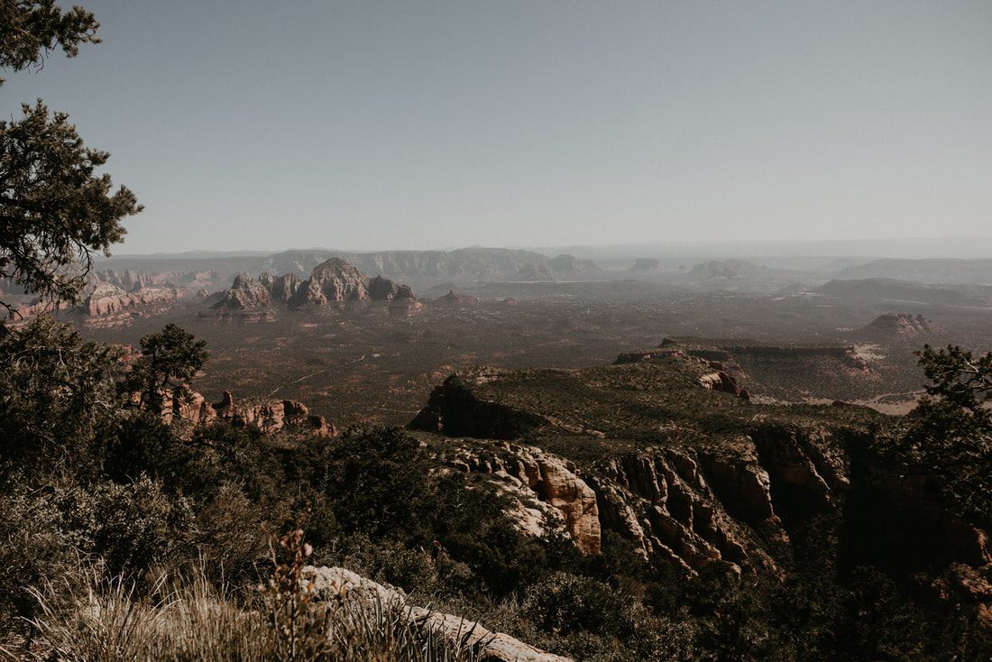 Desert hiking trail winding through Sedona's red rock landscape.