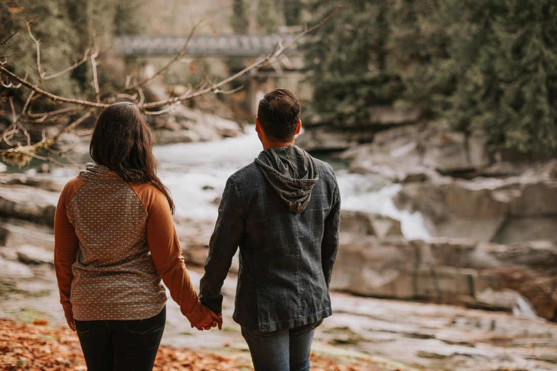 Engagement portrait inside the cozy cabin interior