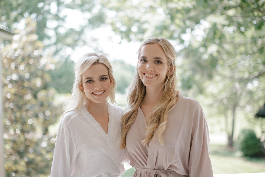 Bride and groom holding hands during golden hour portraits in Nashville