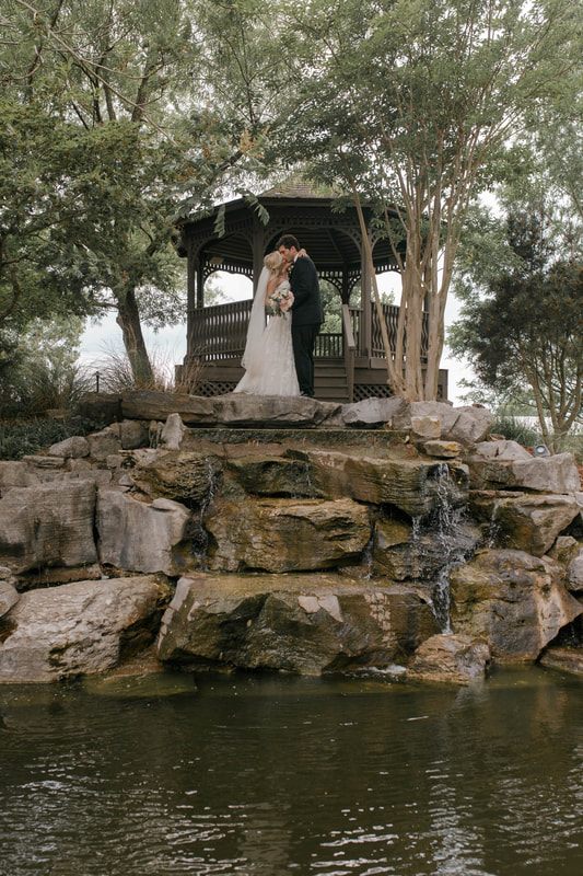 Nashville wedding ceremony arch decorated with greenery