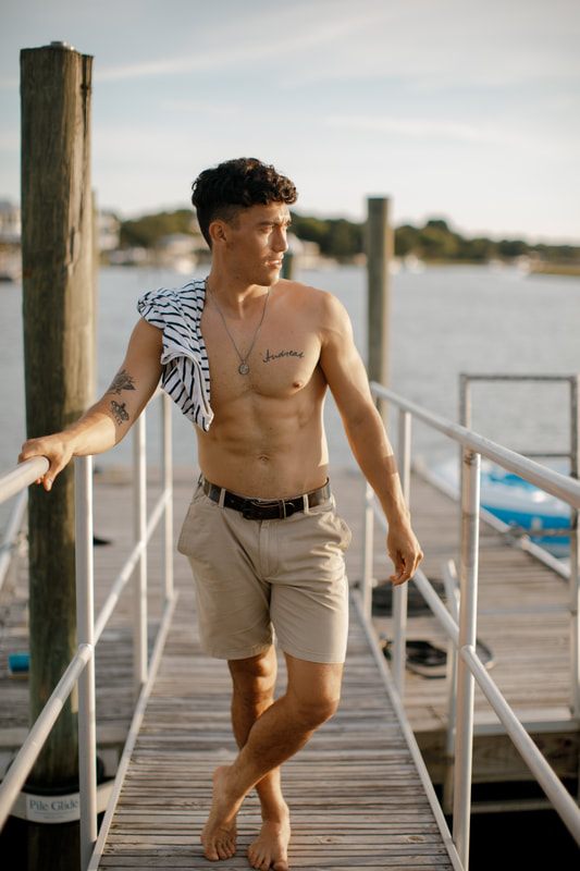 Editorial-style brand photo of a Hanks Belts leather belt on a model