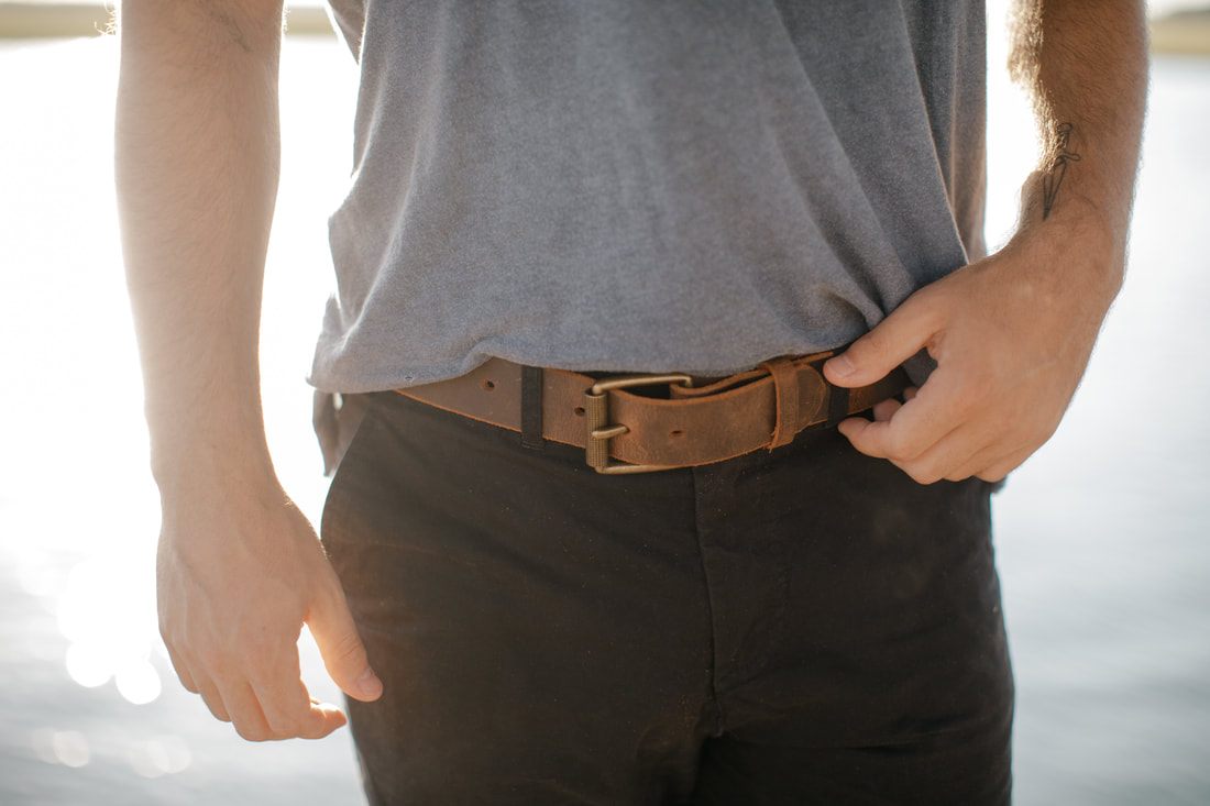 Close-up of a Hanks Belts leather belt buckle detail