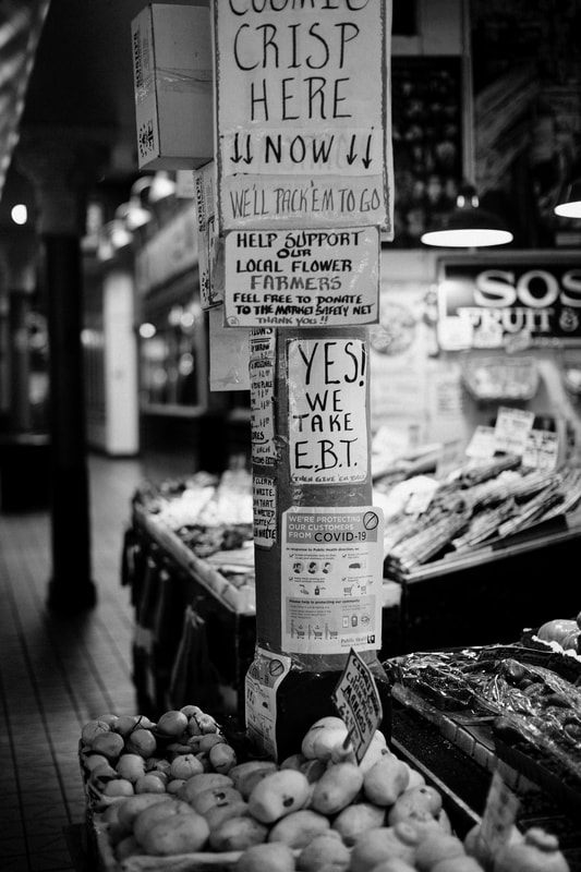 Closed-forever sign on a Seattle storefront during the pandemic shutdown.