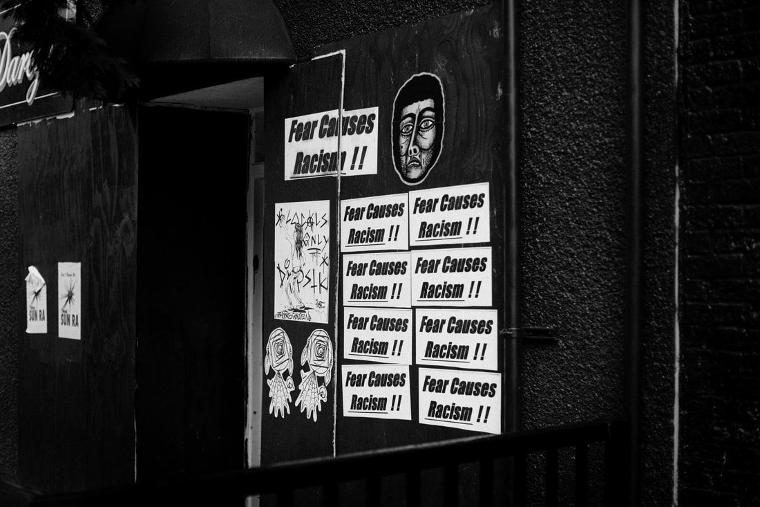 Boarded-up storefront window in downtown Seattle during the coronavirus quarantine.