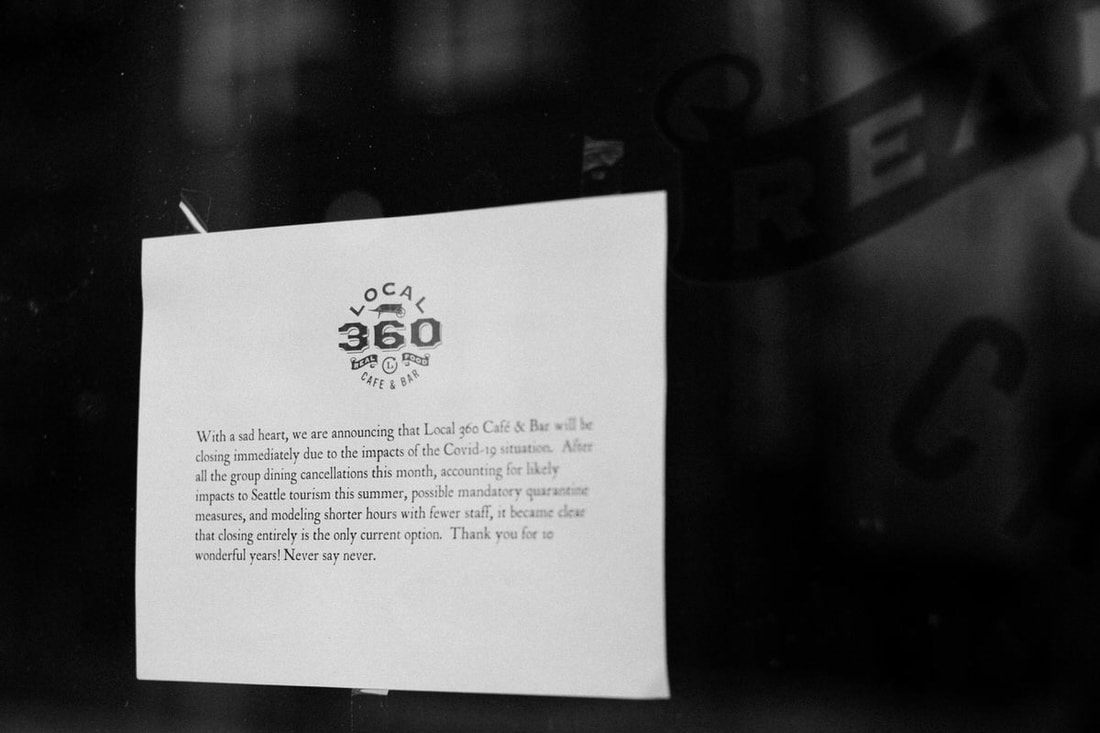 Encouraging hand-lettered sign in a Seattle window during quarantine.