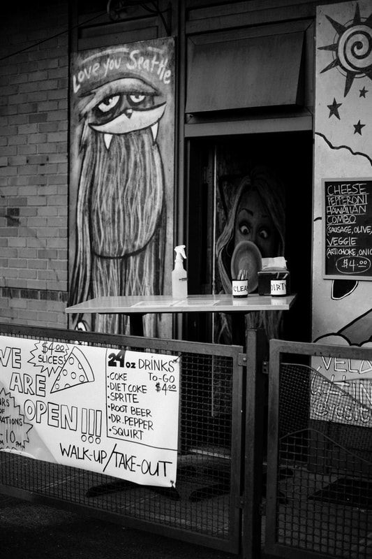 Shuttered restaurant storefront in downtown Seattle during the coronavirus quarantine.
