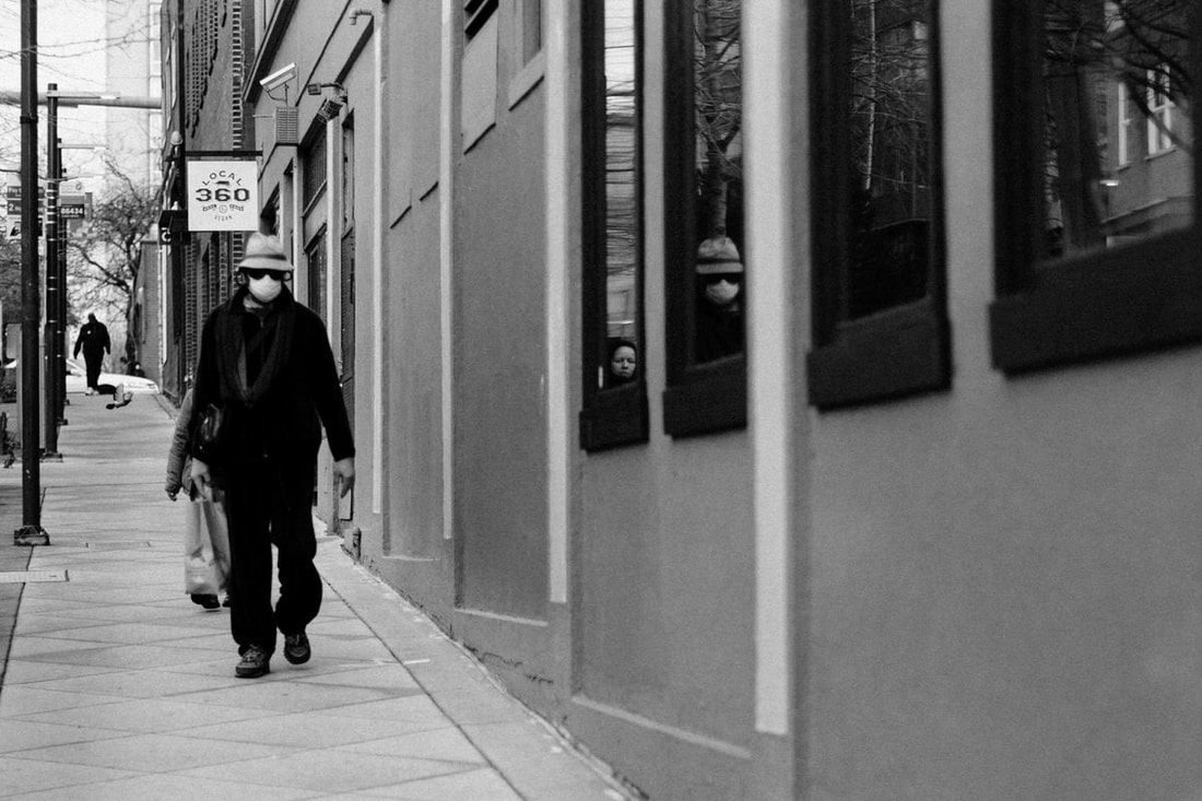 Boarded windows and quiet streets in downtown Seattle, spring 2020.