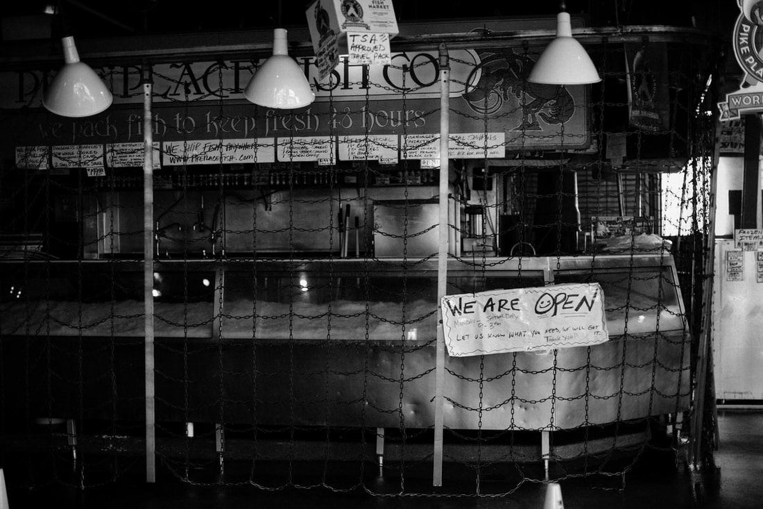Quiet Seattle market, normally packed with vendors, empty during COVID-19.