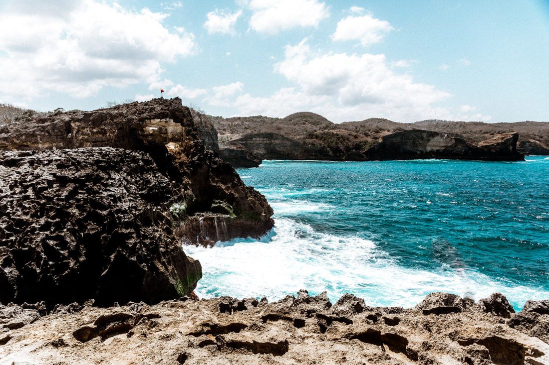 Bali coastline viewed from a cliffside villa