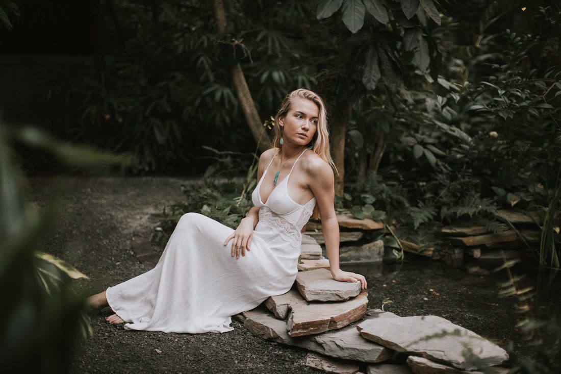 Charleston portrait session with greenery and warm natural light
