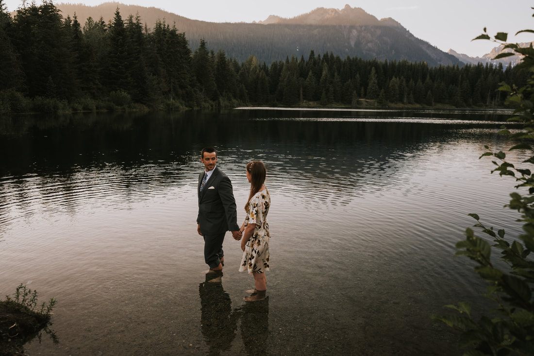 Close-up portrait of the couple kissing outdoors near Snoqualmie