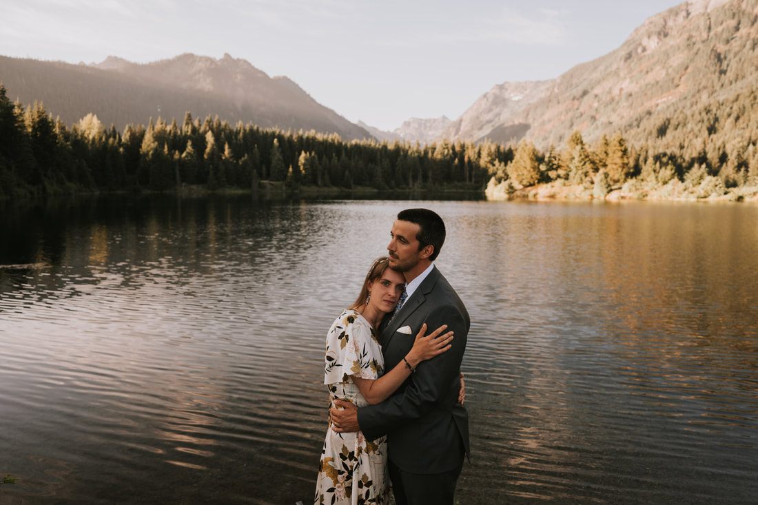 Portrait of the couple with the Cascade foothills behind them