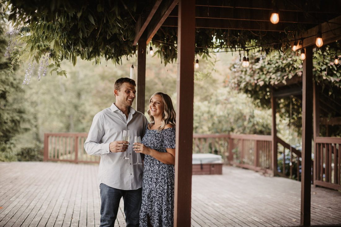 Couple embracing at sunset on their Washington farm