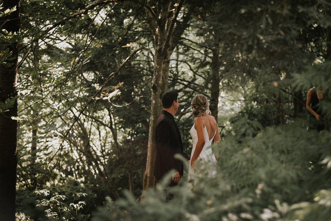 Katie and Alex sharing a quiet moment overlooking the Woodinville vineyard