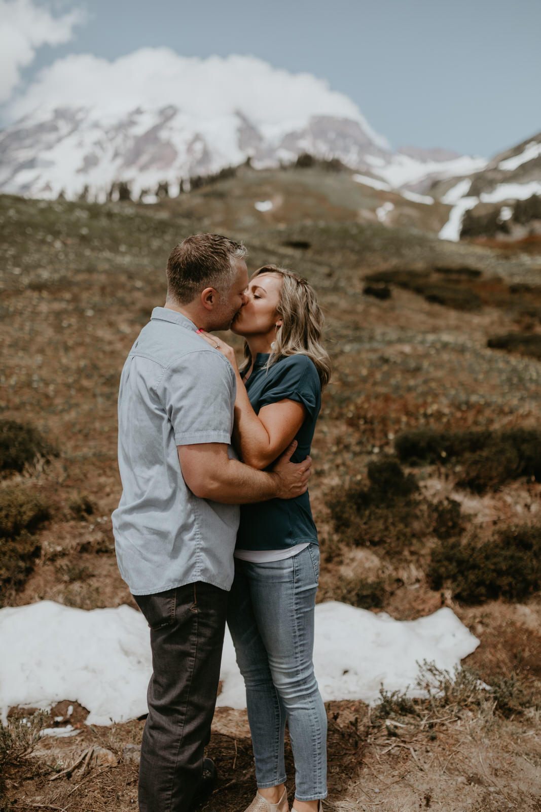 Couple laughing together during their Mt. Rainier engagement session