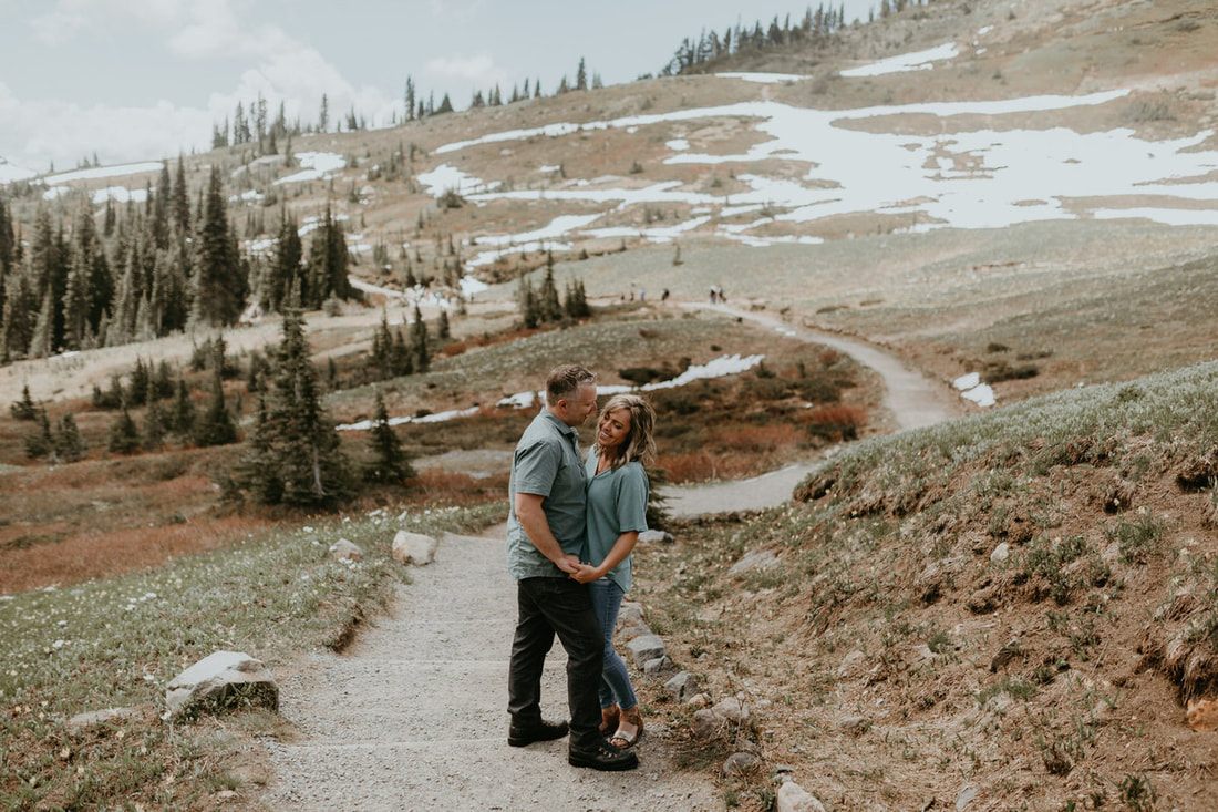 Close-up engagement portrait with Mt. Rainier as a backdrop