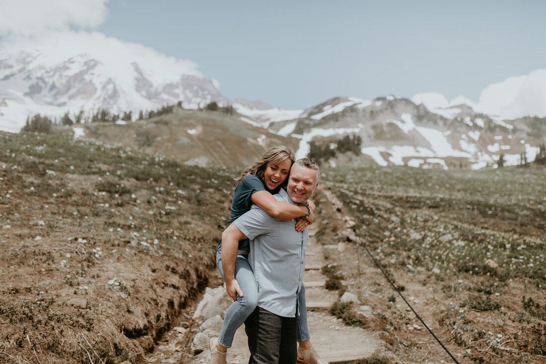 Couple sharing a quiet moment on the mountain trail