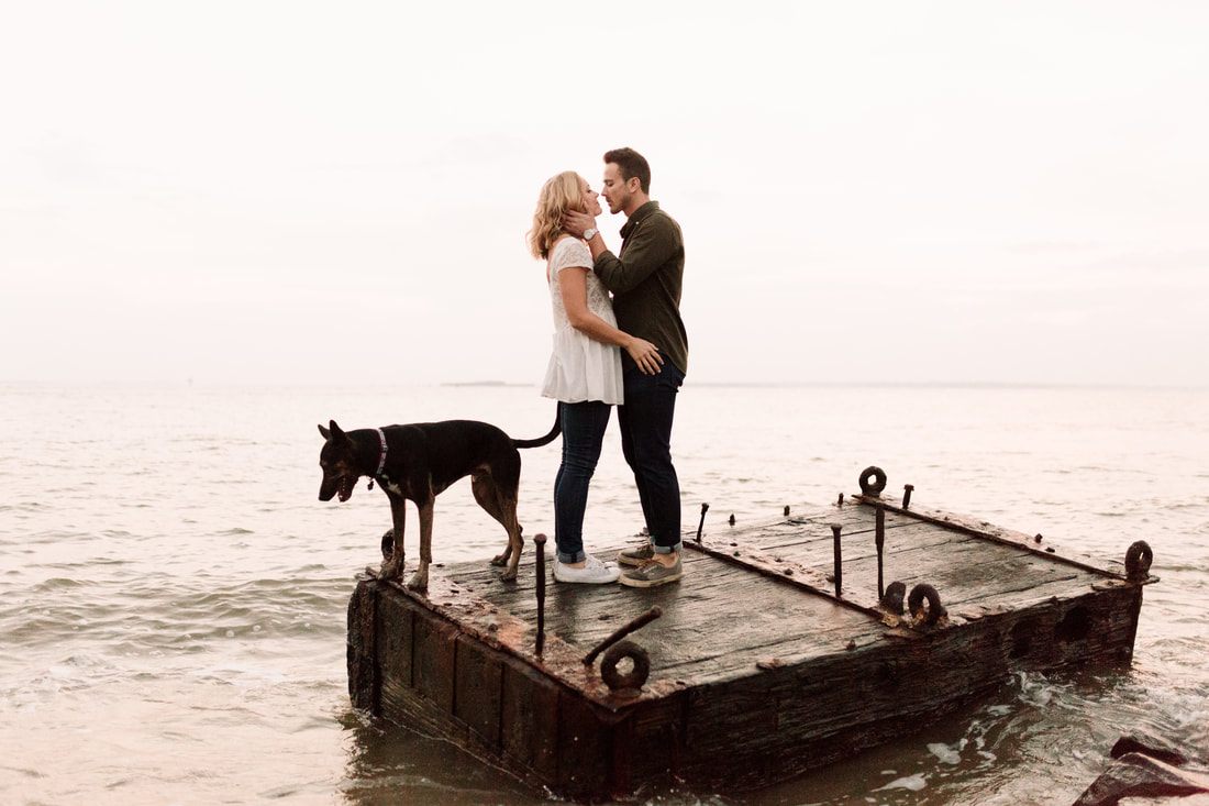 Madison and Ashley sharing a quiet moment on Sullivan's Island at sunset