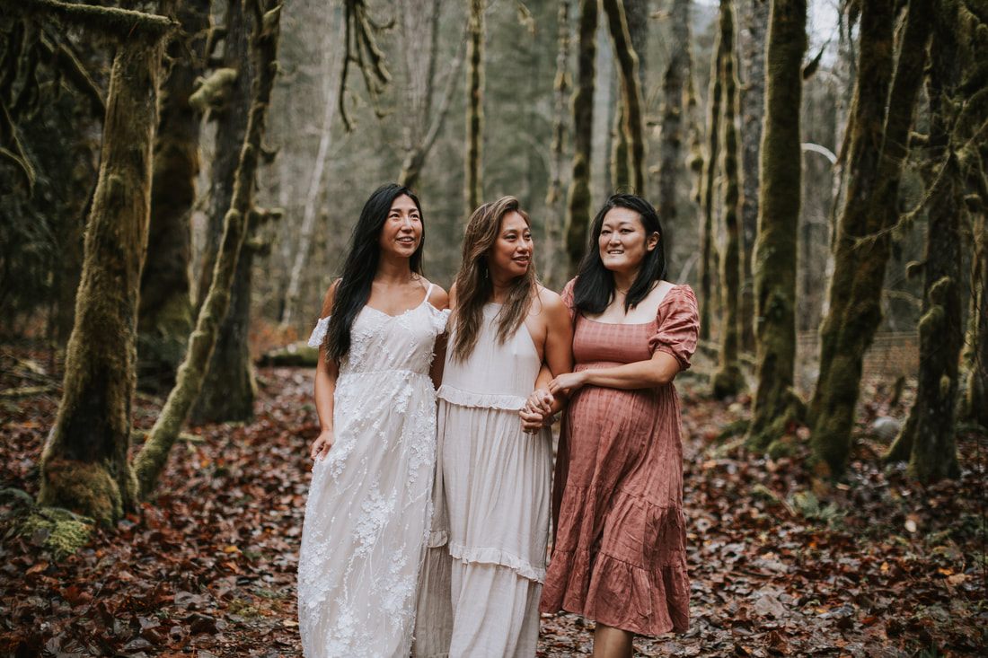 Candid moment of friends laughing together on the cabin steps