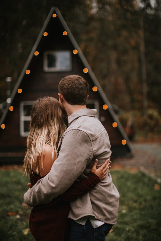 Final portrait of Anthony and Madison at their cabin engagement session