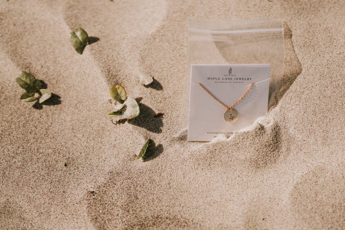 Branded product photography image for Maple Lane Jewelry's necklace collection
