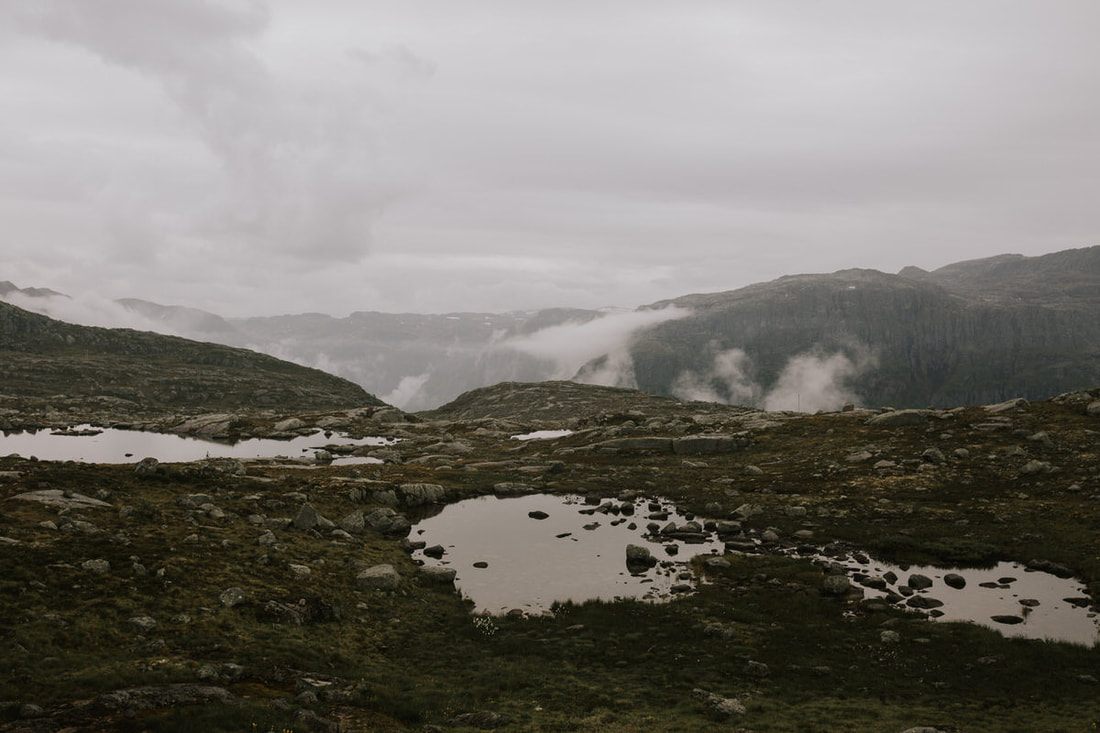 Misty fjord and mountain landscape along the trail to Trolltunga, Norway (another frame from the trip)
