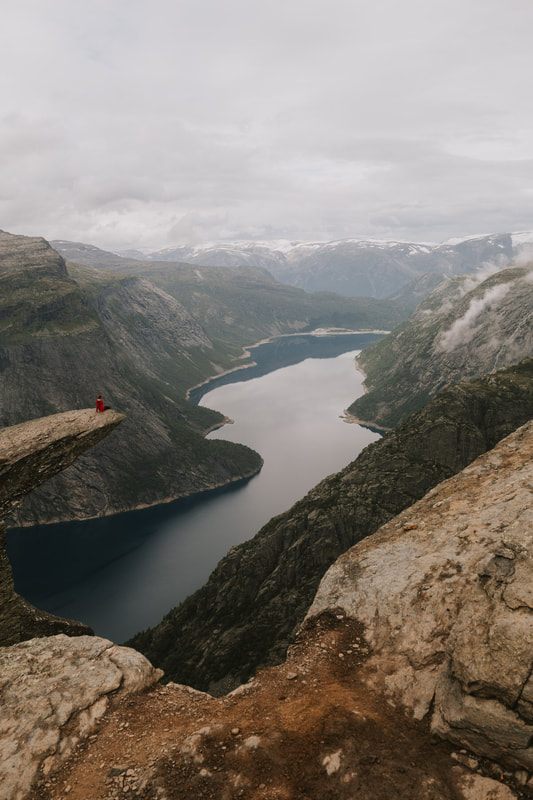 A quiet mountain lake reflecting the sky near the Trolltunga trail (another frame from the trip)