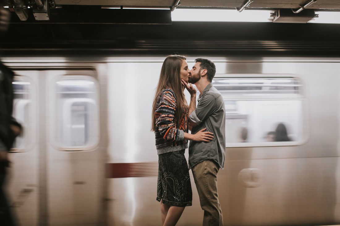 Engaged couple embracing on a New York City street