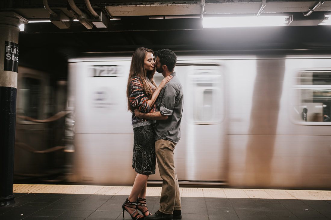 Couple sharing a quiet moment on a New York City street corner